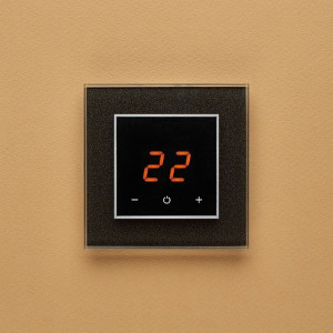 Терморегулятор DeLUMO Orto 0337 сияющий черный на желтом фоне