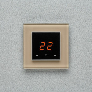 Терморегулятор DeLUMO Orto 1236 светлый коричневый на серой стене