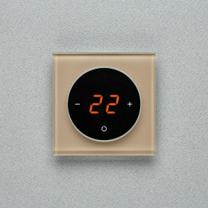 Терморегулятор DeLUMO Takto 1236 светлый коричневый на серой стене