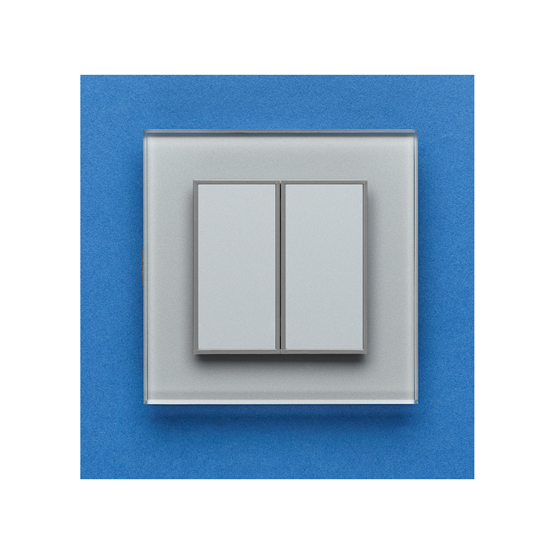 Одноканальный двухклавишный радиопульт DeLUMO Orto 9006 серый металлик на синей стене