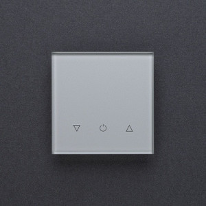 Одноканальный трехклавишный сенсорный радиопульт DeLUMO Senso 9006 серый металлик на темной стене