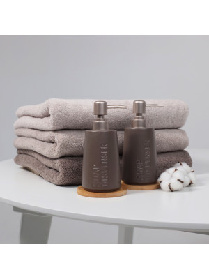 Дозатор жидкого мыла AksHome Stone серый в интерьере